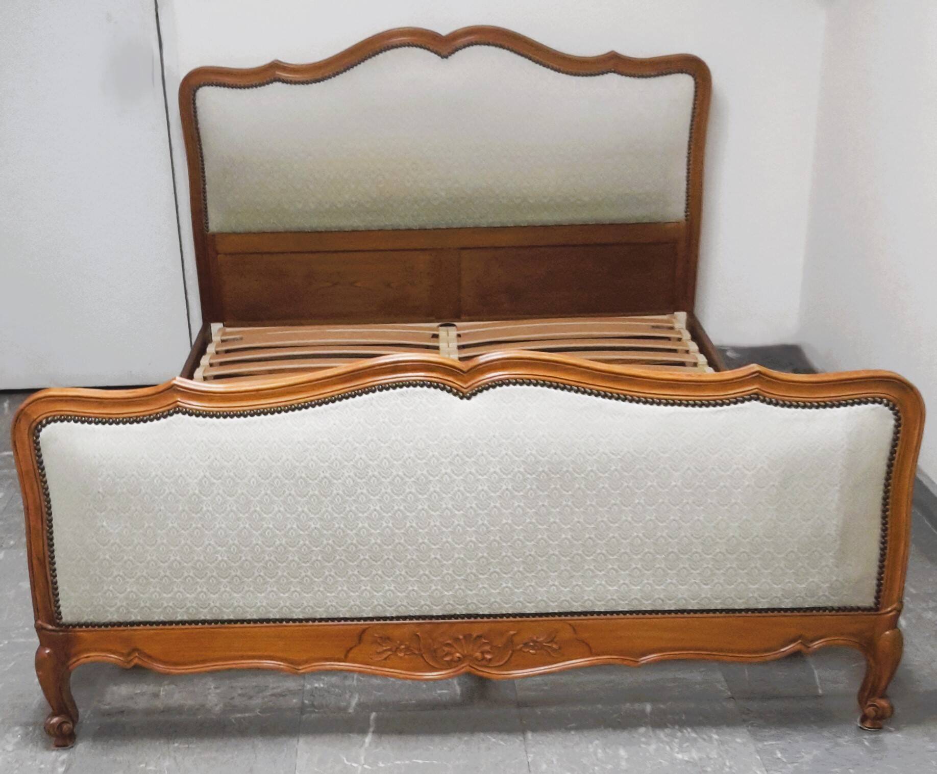 Cabinetmaker's bed frame and matching upholstered bedspread