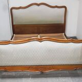 Cabinetmaker's bed frame and matching upholstered bedspread