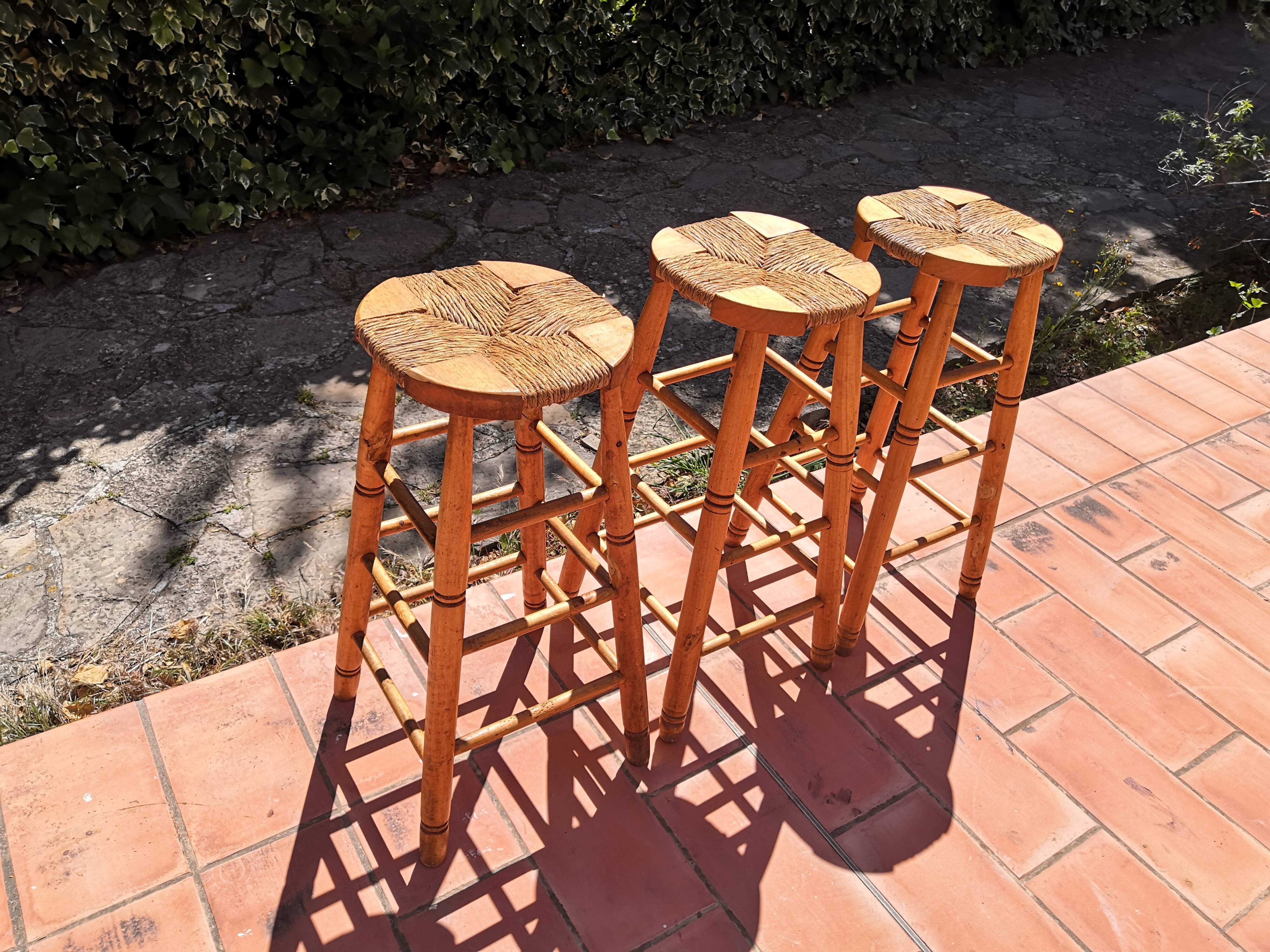 Set of 3 high “modernist” straw stools vintage 1950s
