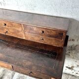 Wooden lady's desk says "happiness of the day"