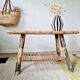 Table basse en rotin plateau tissu fleuri jaune