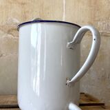 Old white and blue enamelled enema pot
