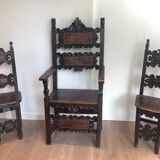 Set of an armchair and a pair of chairs in Italian Renaissance walnut