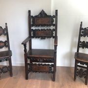 Set of an armchair and a pair of chairs in Italian Renaissance walnut