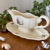 Antique sauce boat in Sarreguemines earthenware.