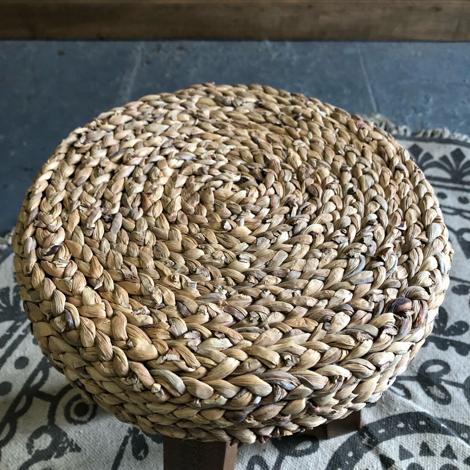 Tripod stool made of wood and water hyacinth