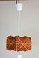 Suspension fil et bois marron.