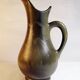 Pitcher jug in brown sandstone