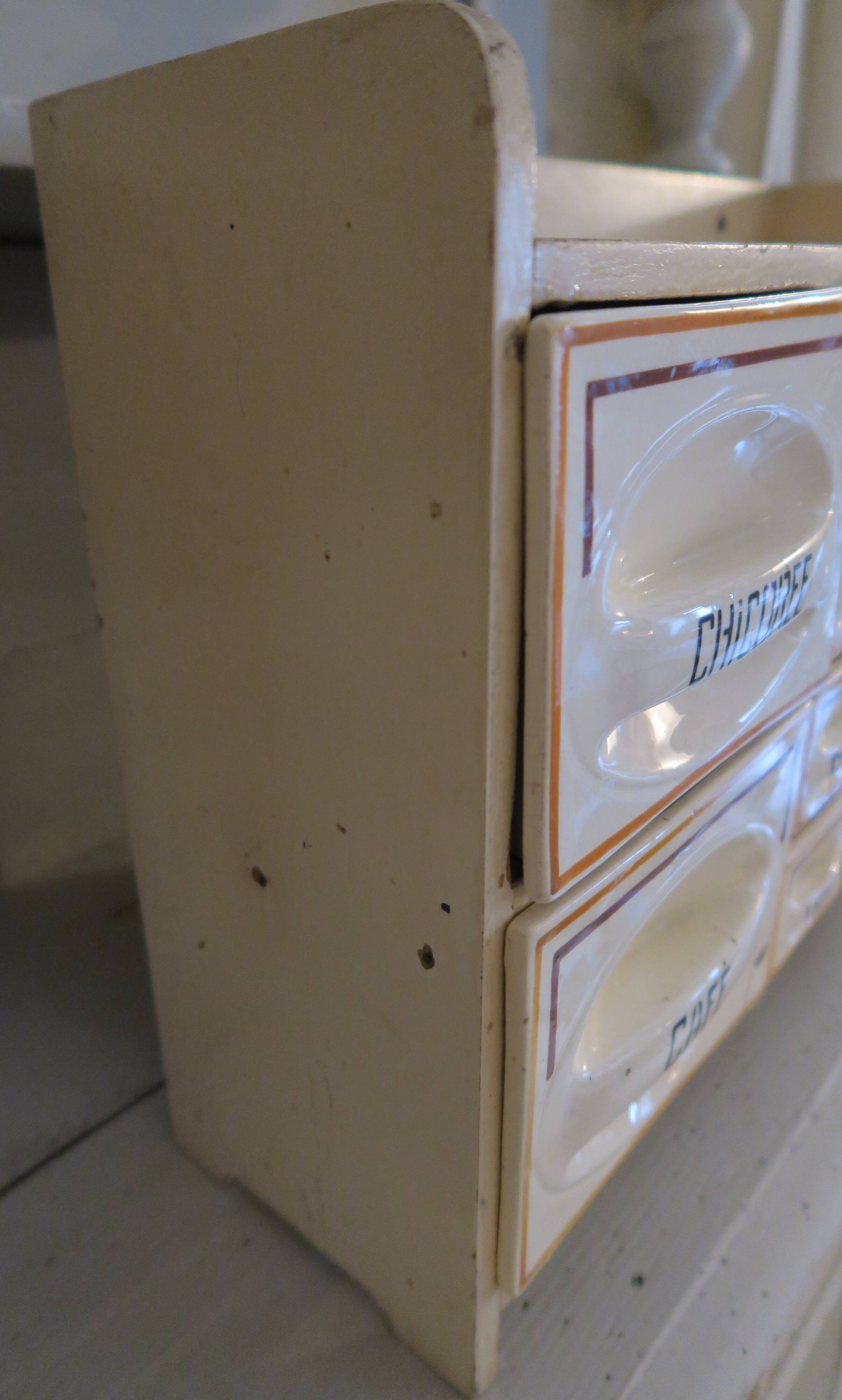 Spice cabinet with earthenware drawers