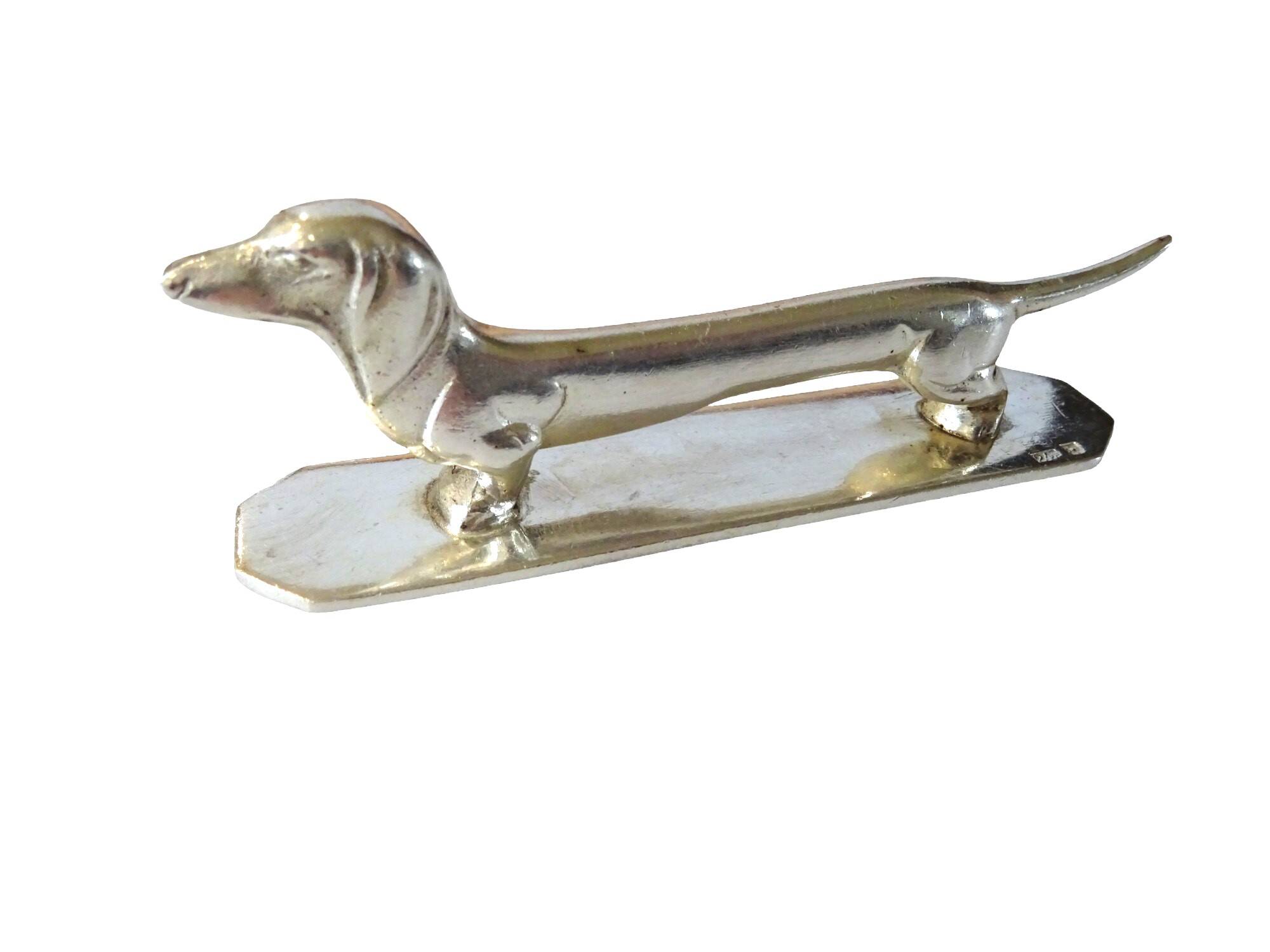 12 Art Deco animal knife holders in silvered bronze
