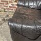 Pair of patinated leather club armchairs