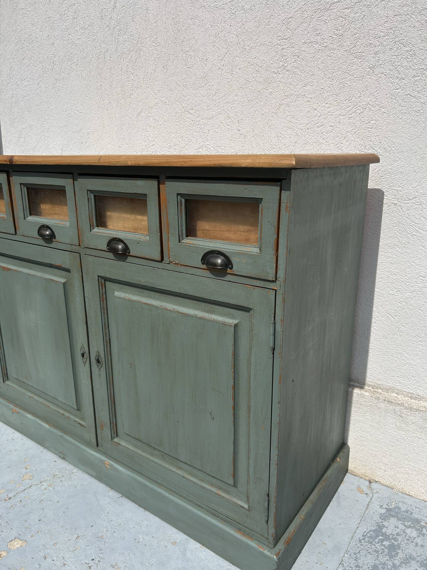Antique counter cabinet with drawers and label holders – green patina