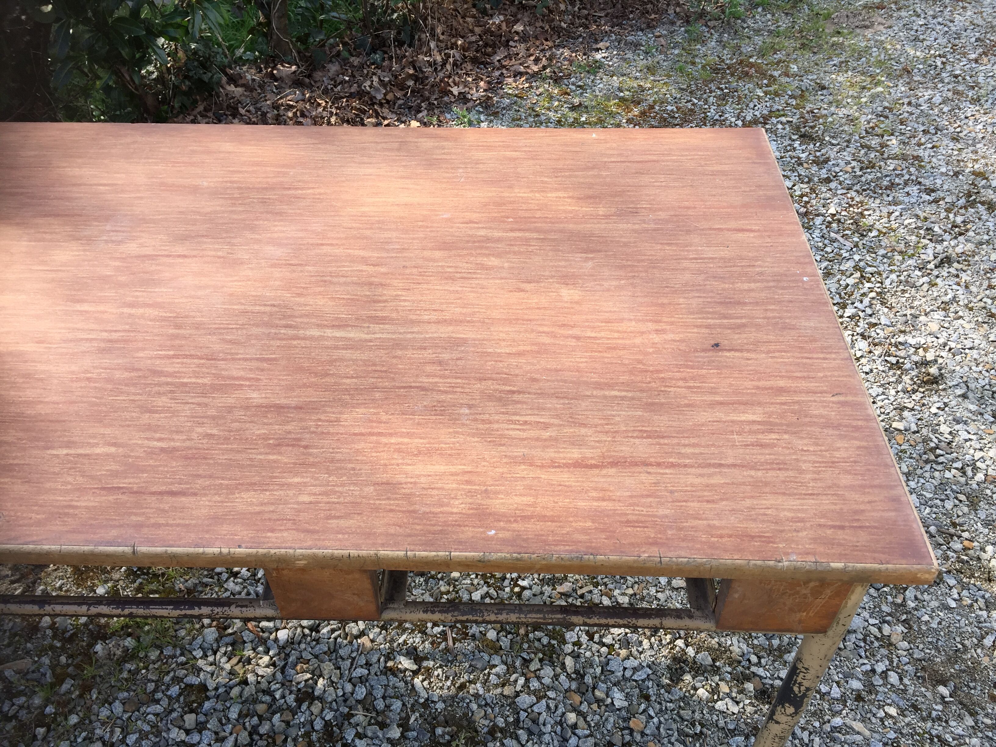 Vintage modernist table with metal tubular base