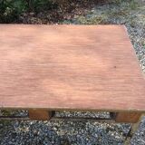 Vintage modernist table with metal tubular base