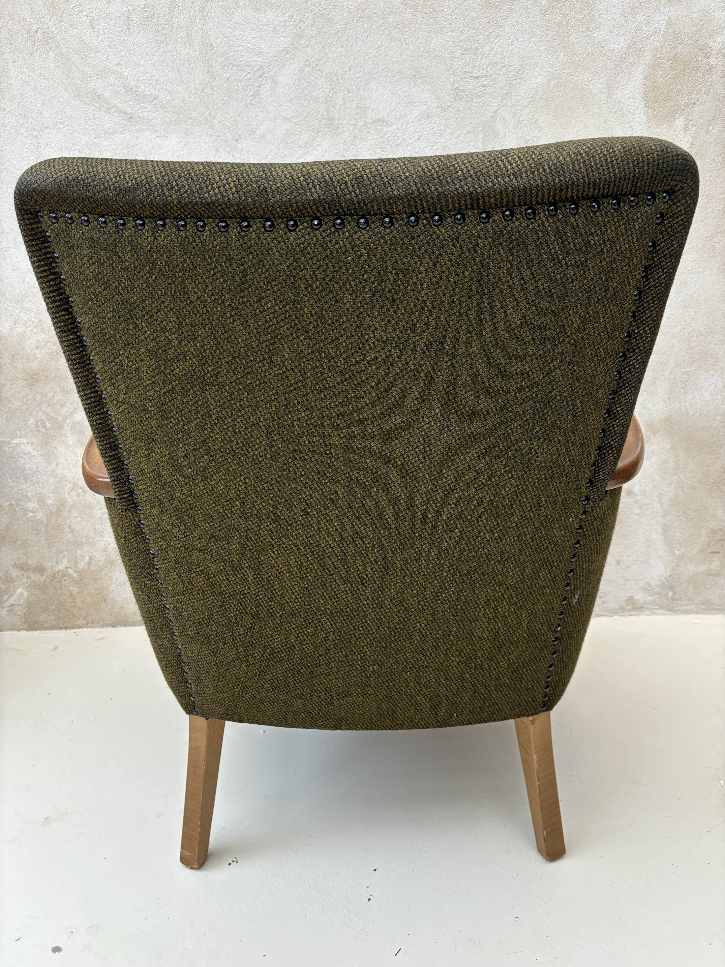 Pair of vintage wooden and fabric armchairs from the 1960s.