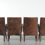 Set of 4 nicely finished dining chairs/side chairs with armrests made of cowhide leather