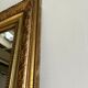 Gilded mirror with frieze h2m10 l:73cm