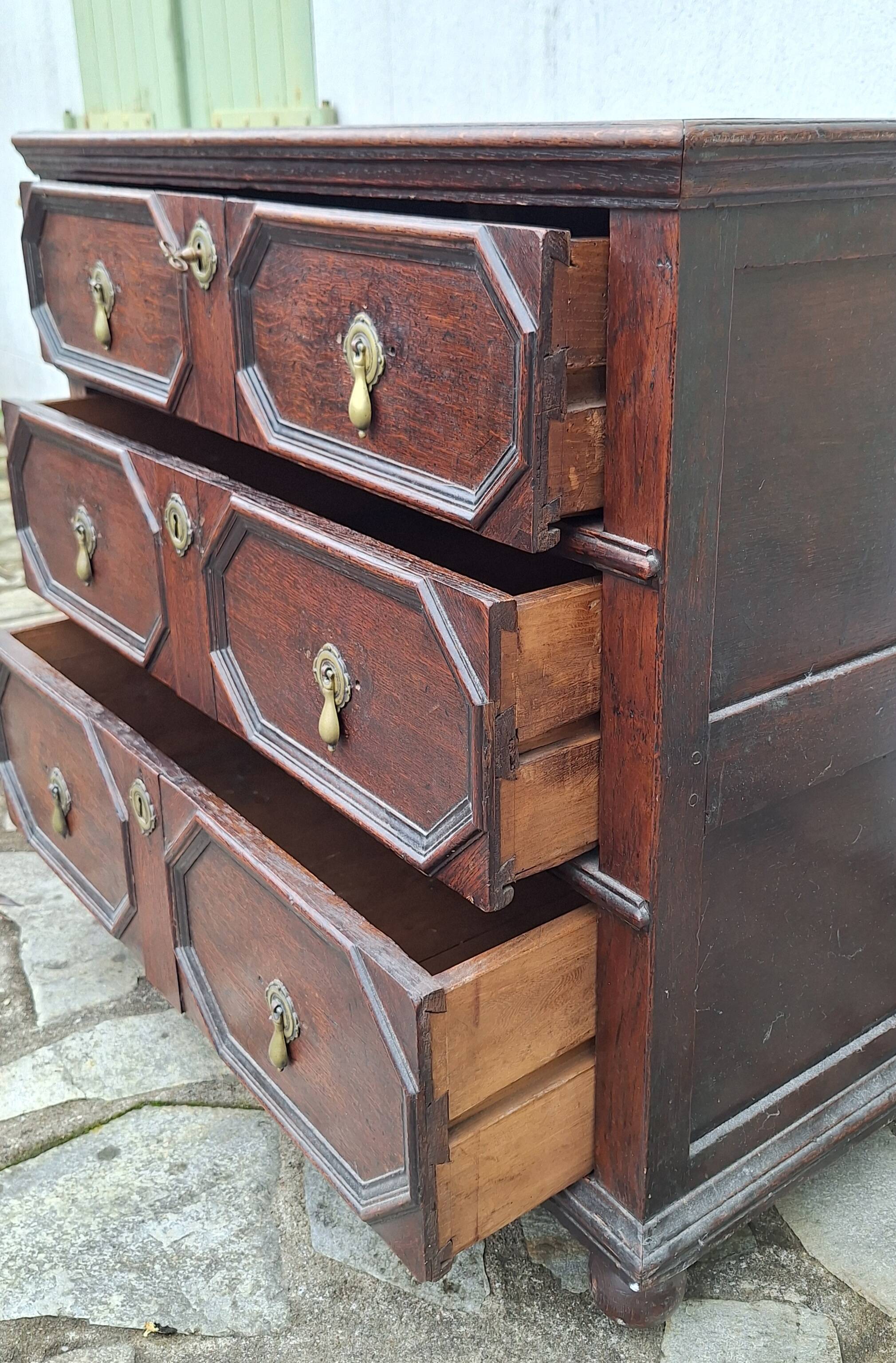Jacobean style wooden chest of drawers