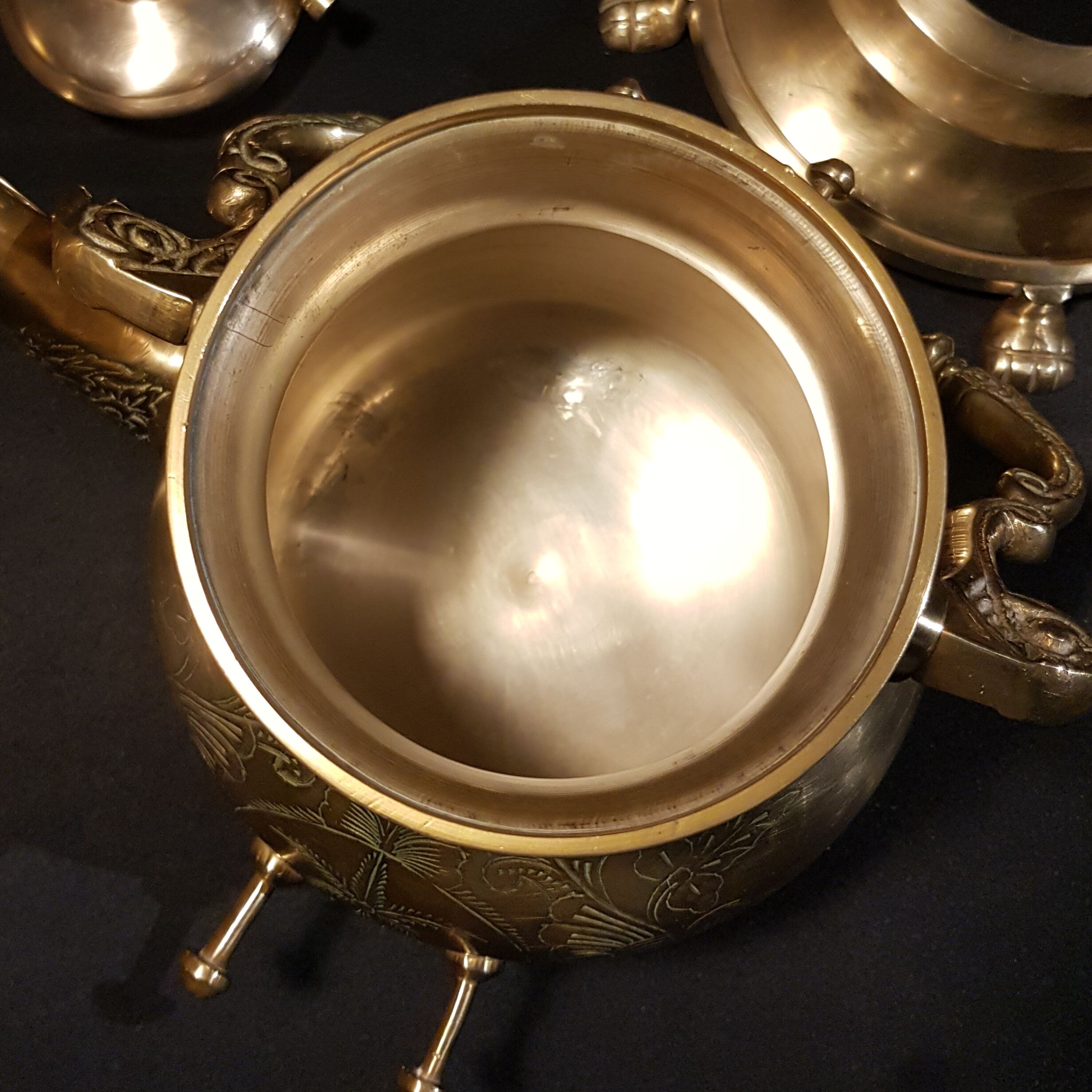 Oriental teapot on its support