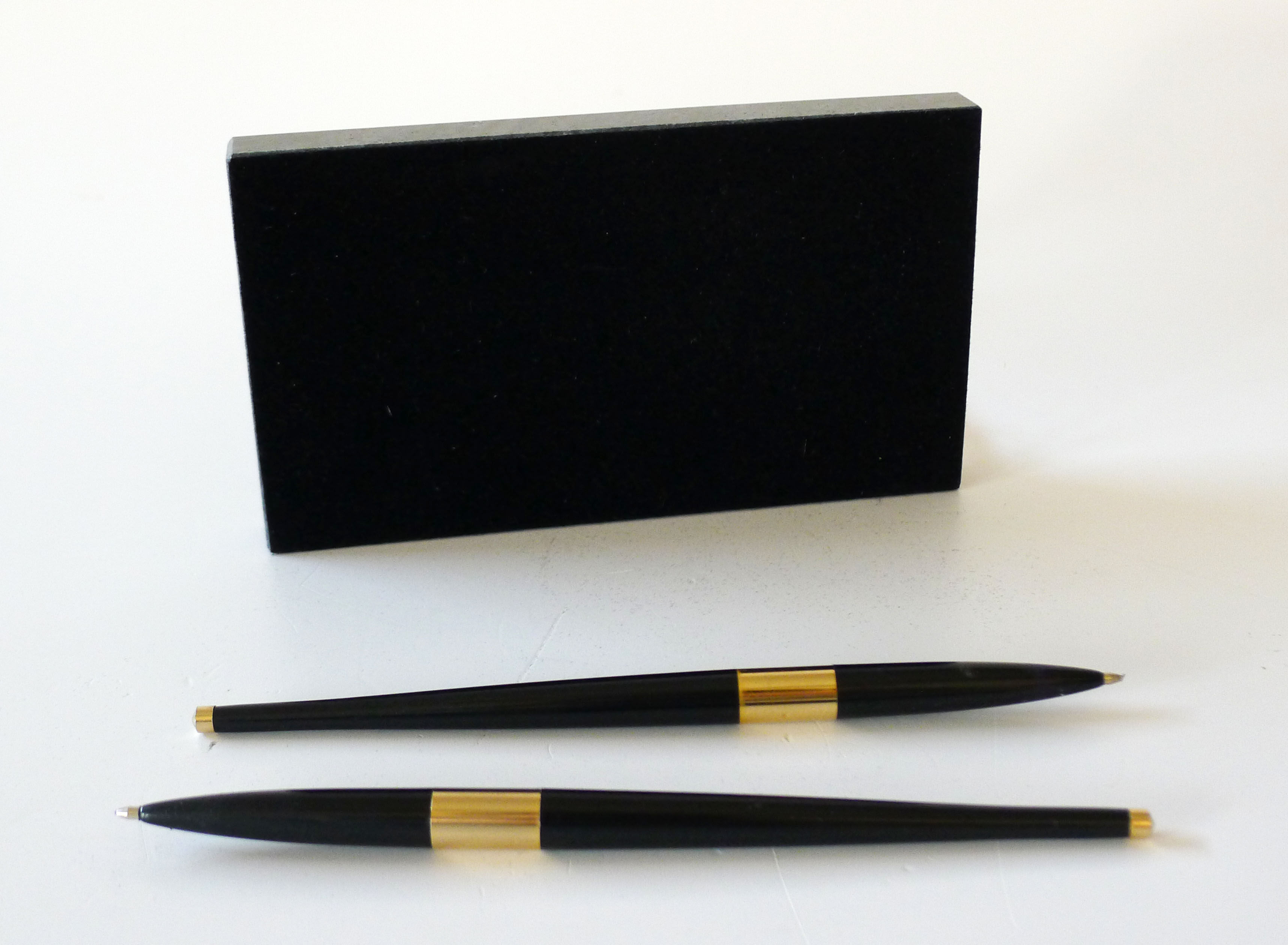 Pen doors on marble base