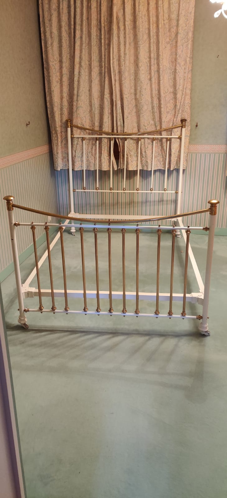 Restored old iron bed
