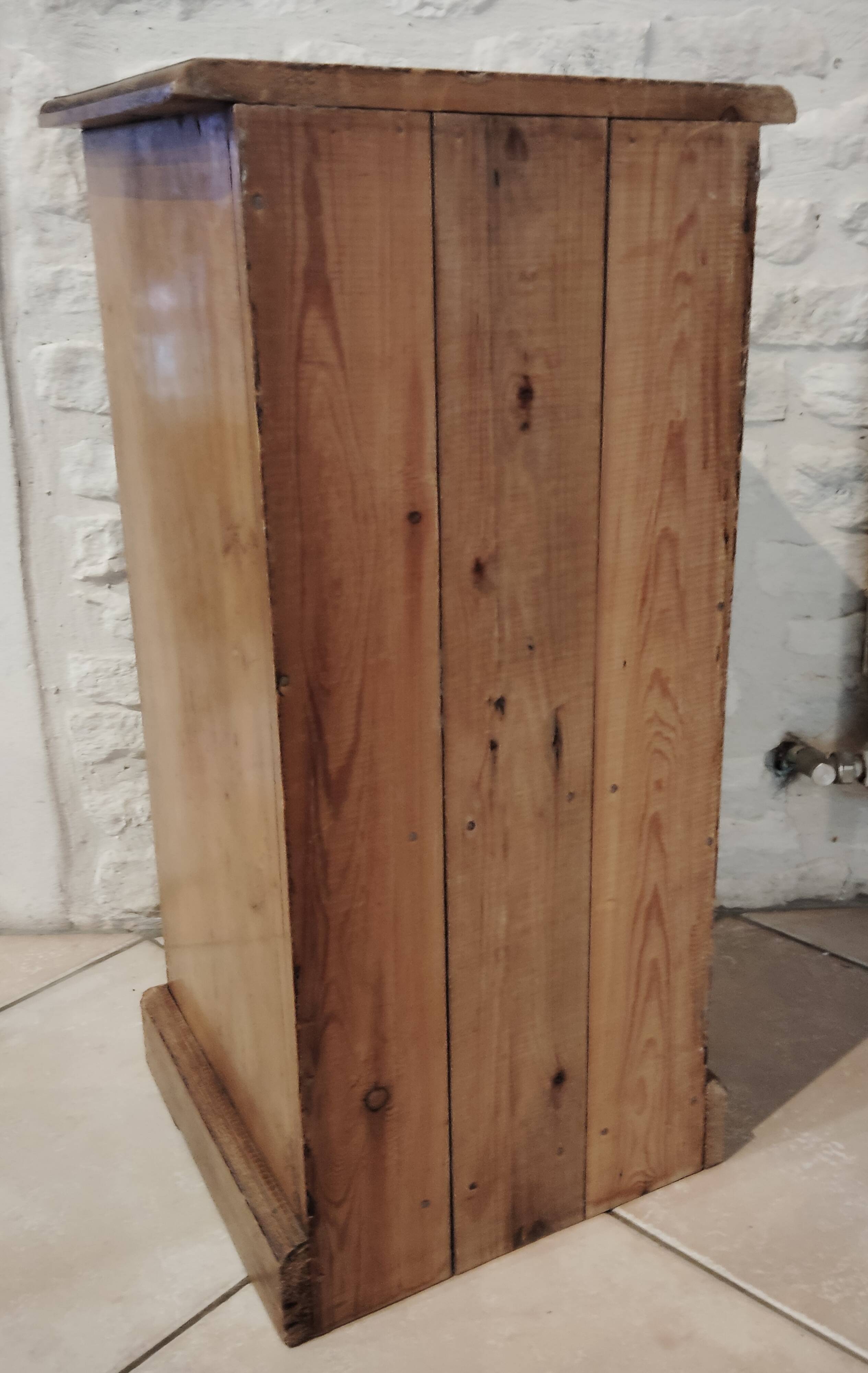 Old bedside table in old pine