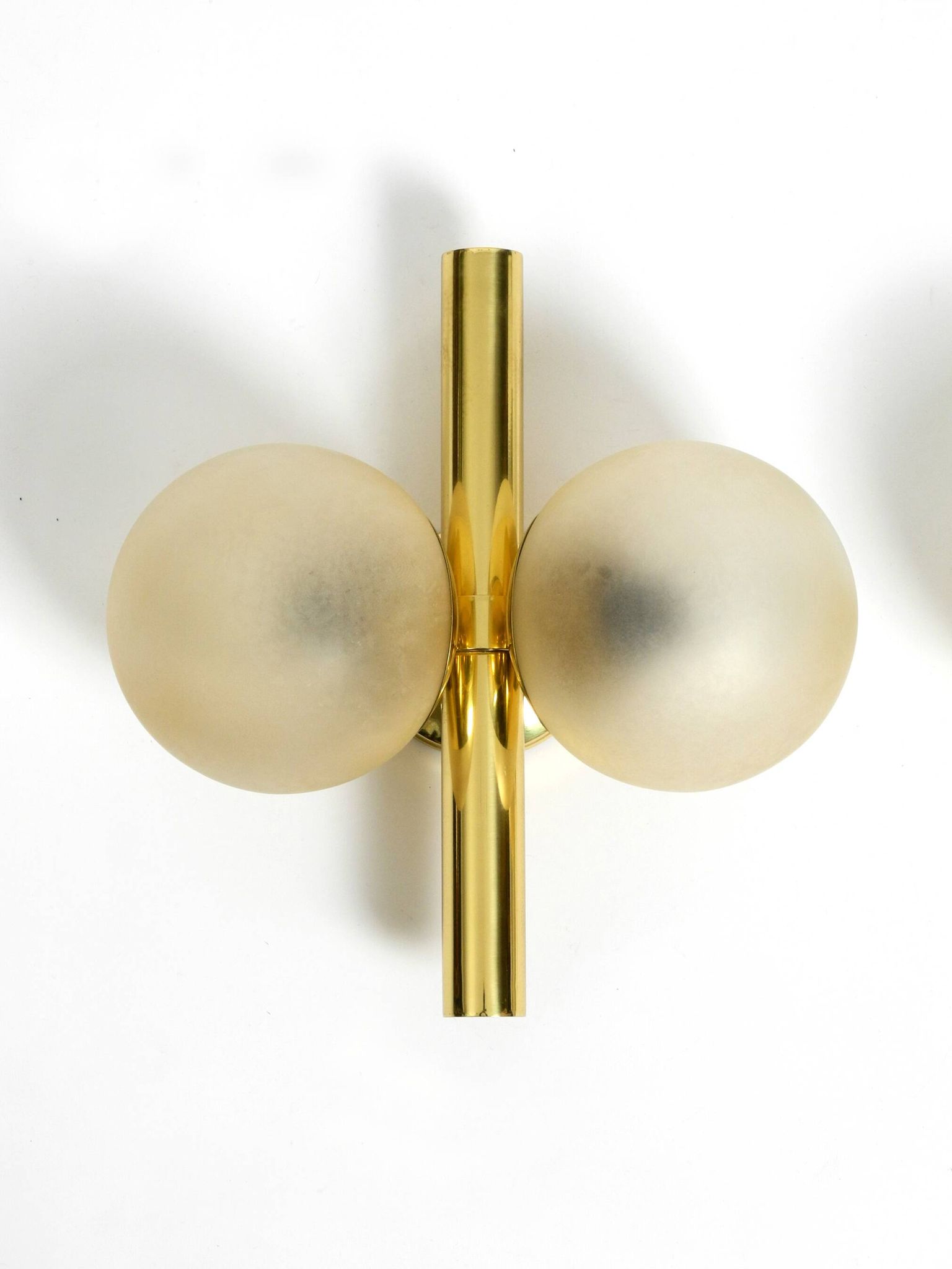 Pair of beautiful 60s Kaiser brass wall lamps with two golden glass spheres