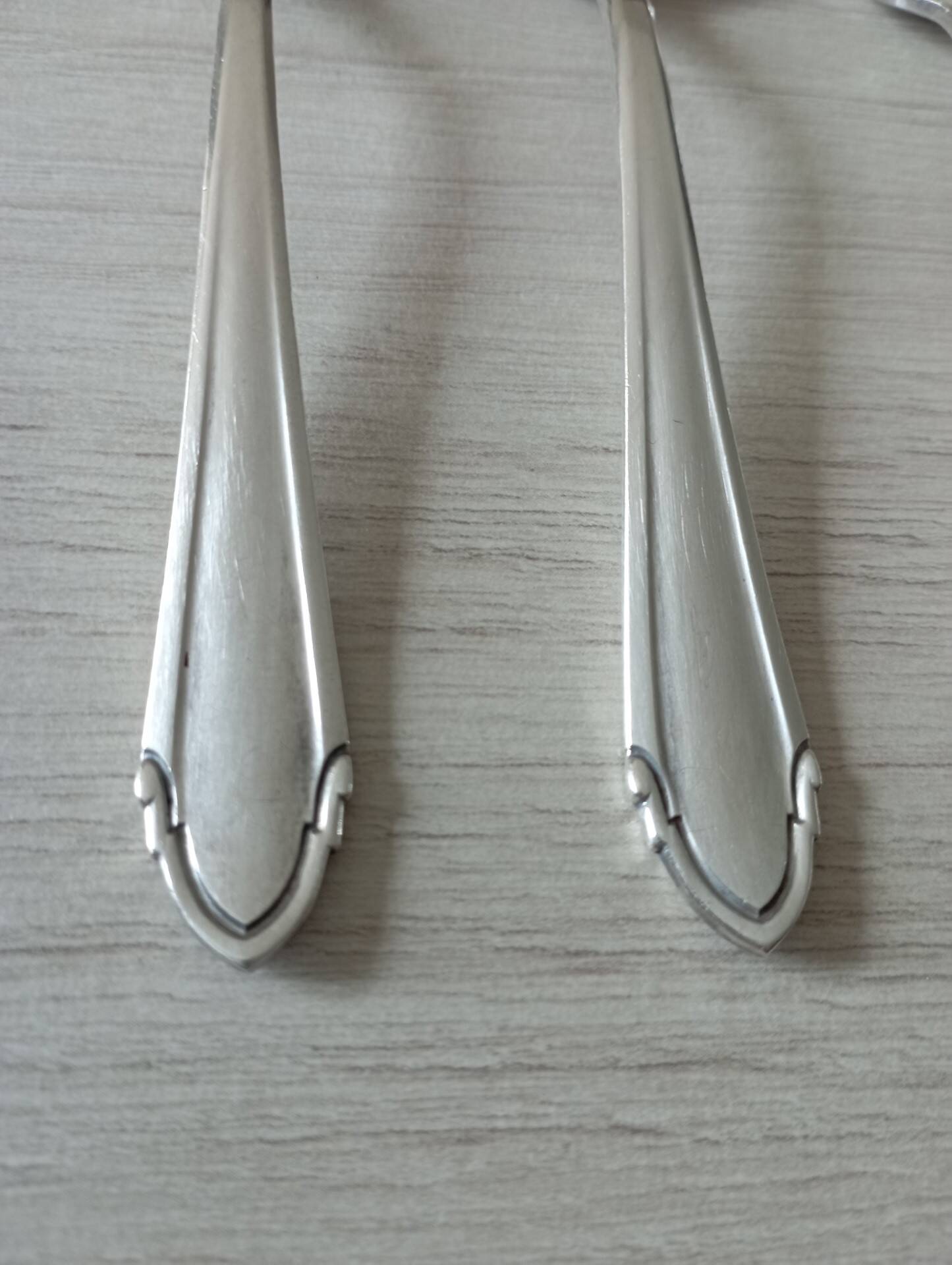Small silver metal spoons