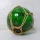 Boule, flotteur en verre vert vintage