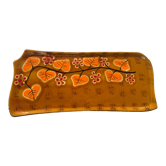 Cake dish in ochre glazed ceramic and vintage orange foliage