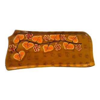 Cake dish in ochre glazed ceramic and vintage orange foliage