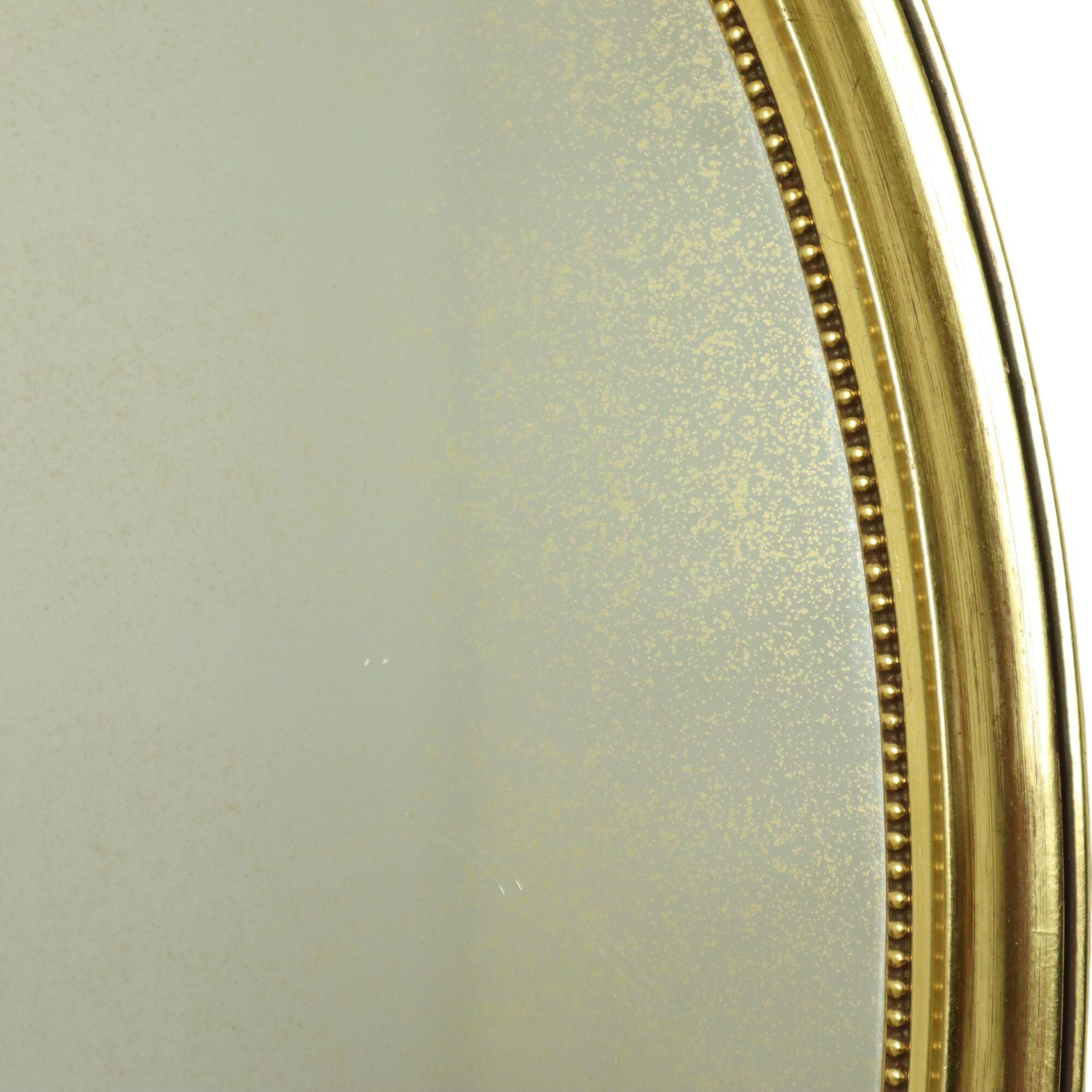 Miroir ovale classique doré à décor de ruban, France