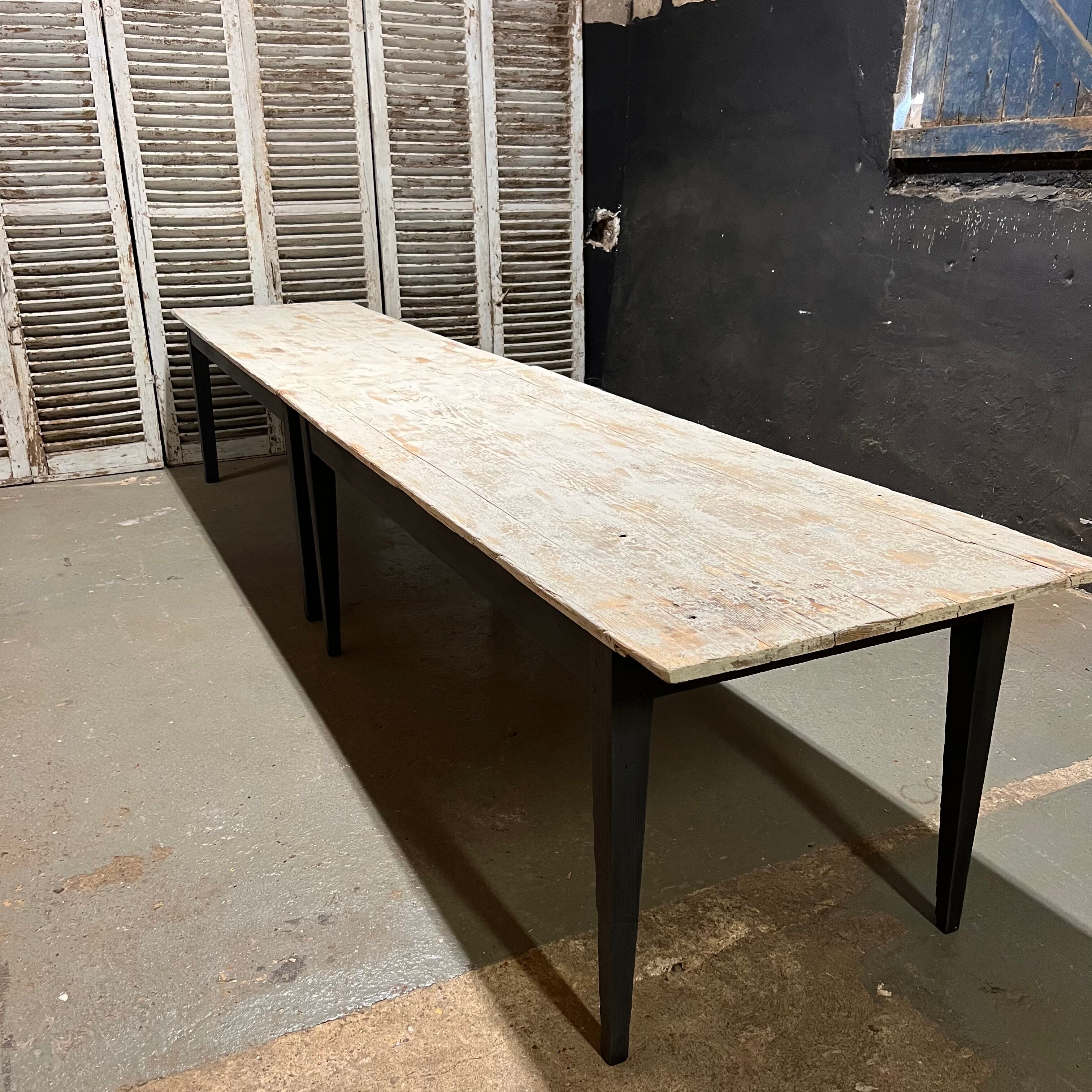 Black farmhouse table and white patinated top