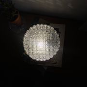 Vintage 1970s round wall light ceiling fixture with transparent glass.