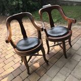 Pair of antique brown swivel armchairs in upholstery fabric, wooden frame, Hungary circa 1900.