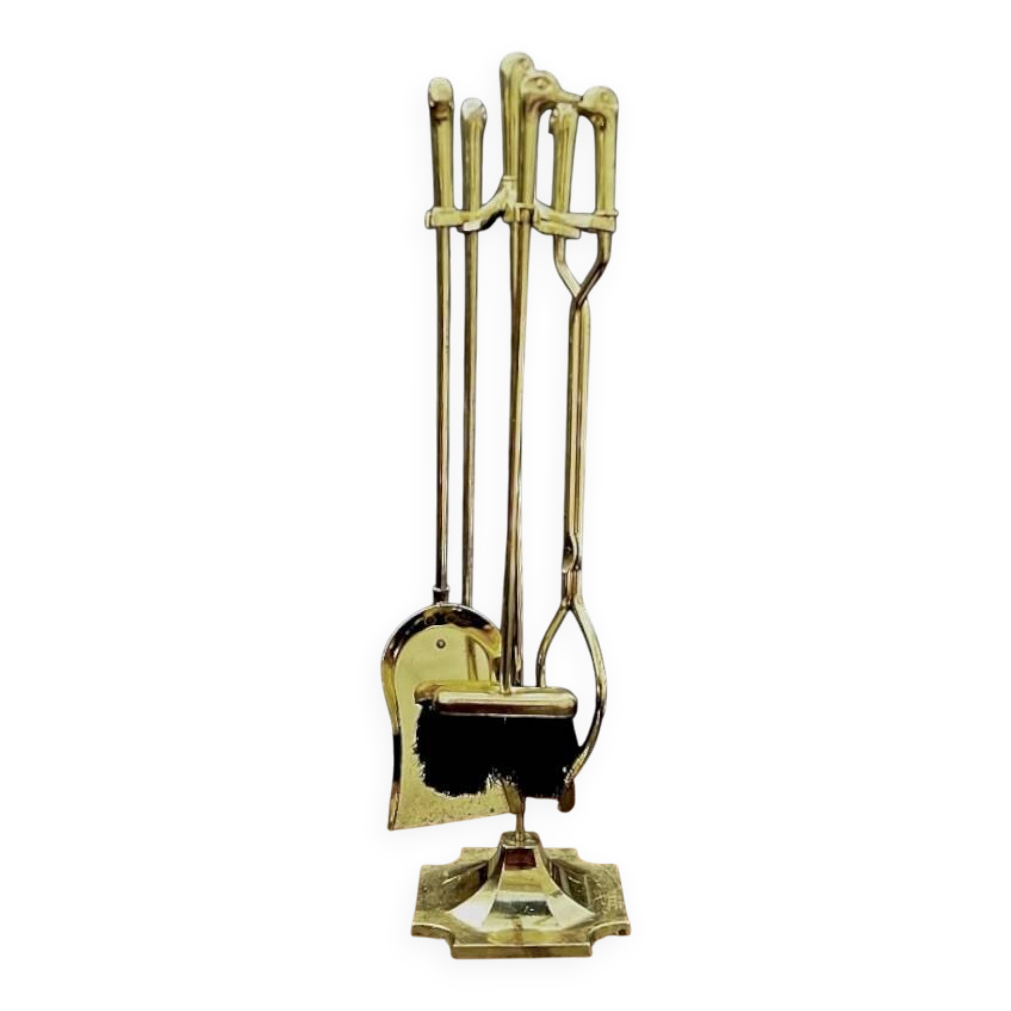Antique fireplace tool in gilded zamak with duck head designs.