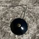 Vintage pendant light in green and black enamelled sheet metal, retro decor, closed