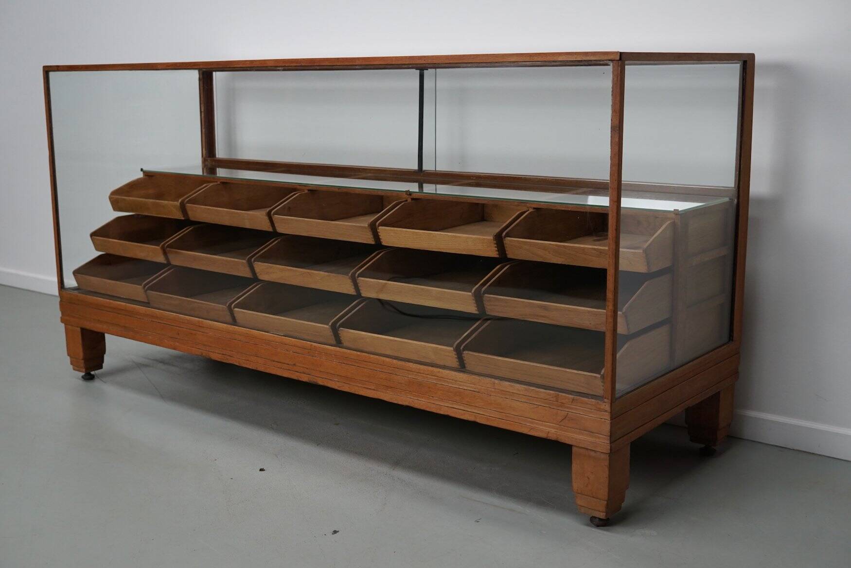 Antique British oak haberdashery cabinet, 1930s