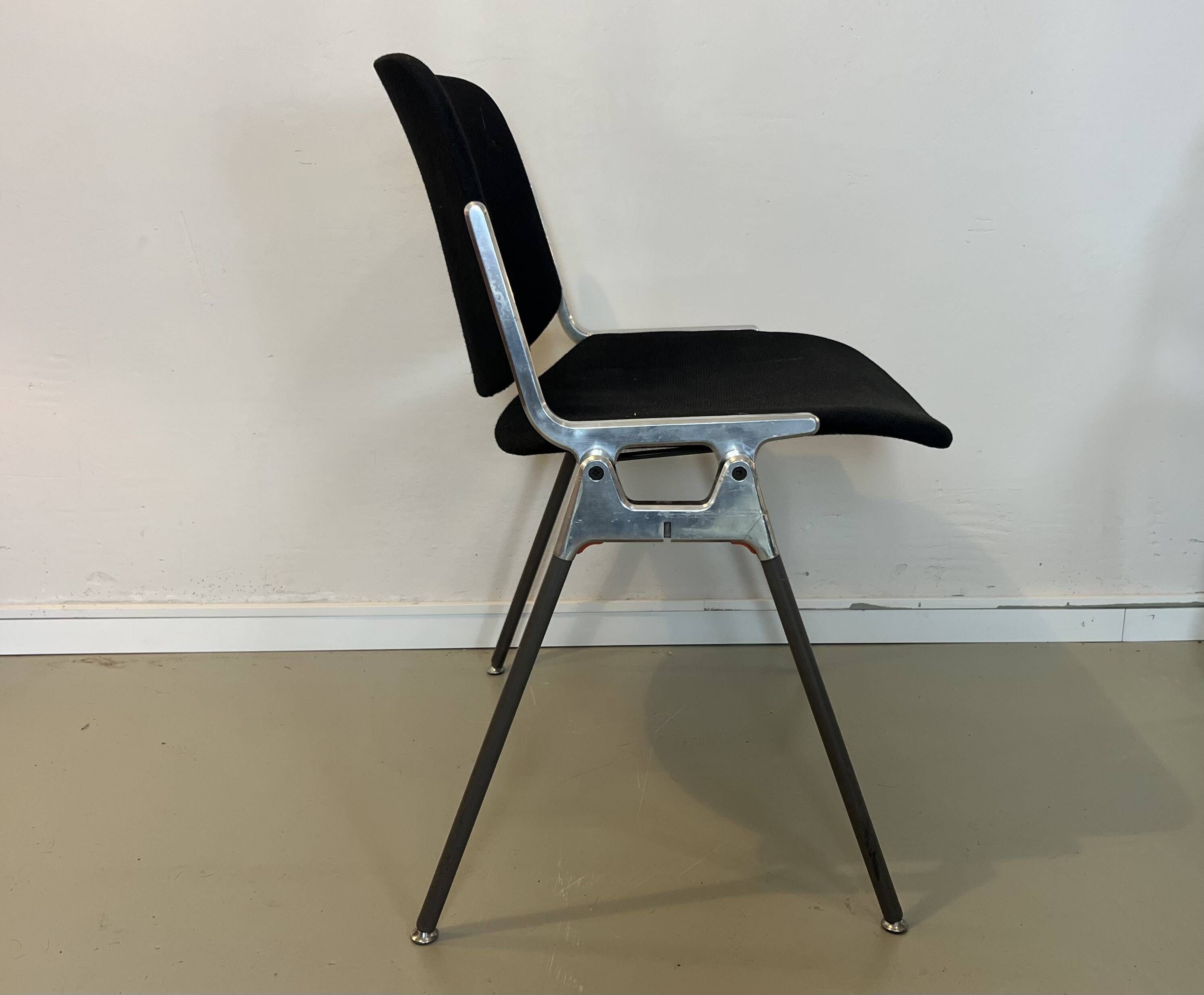 Black DSC chairs by Giancarlo Piretti for Castelli from the 60s/70s.