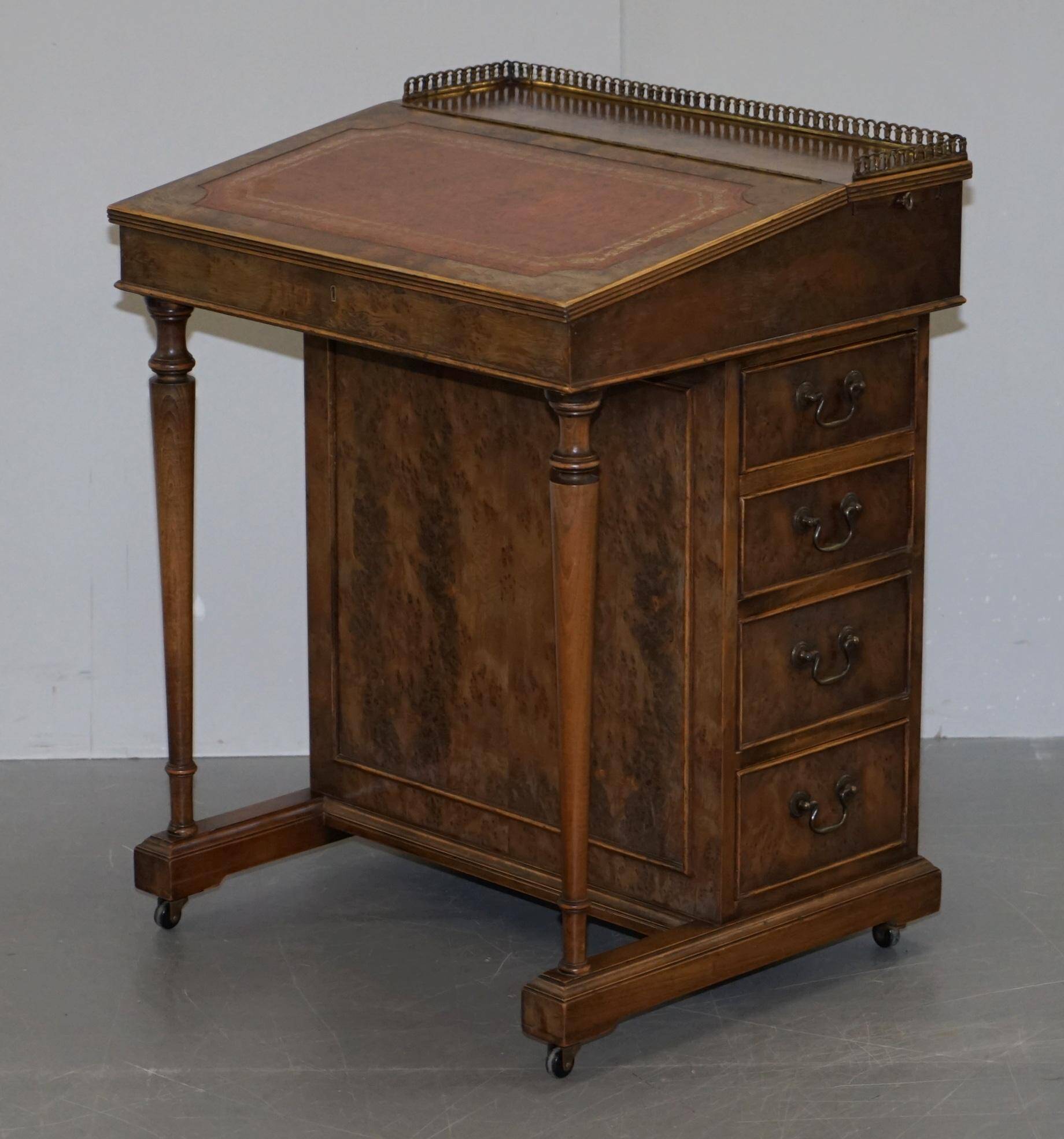 Davenport desk in walnut with leather and vintage brass gallery.