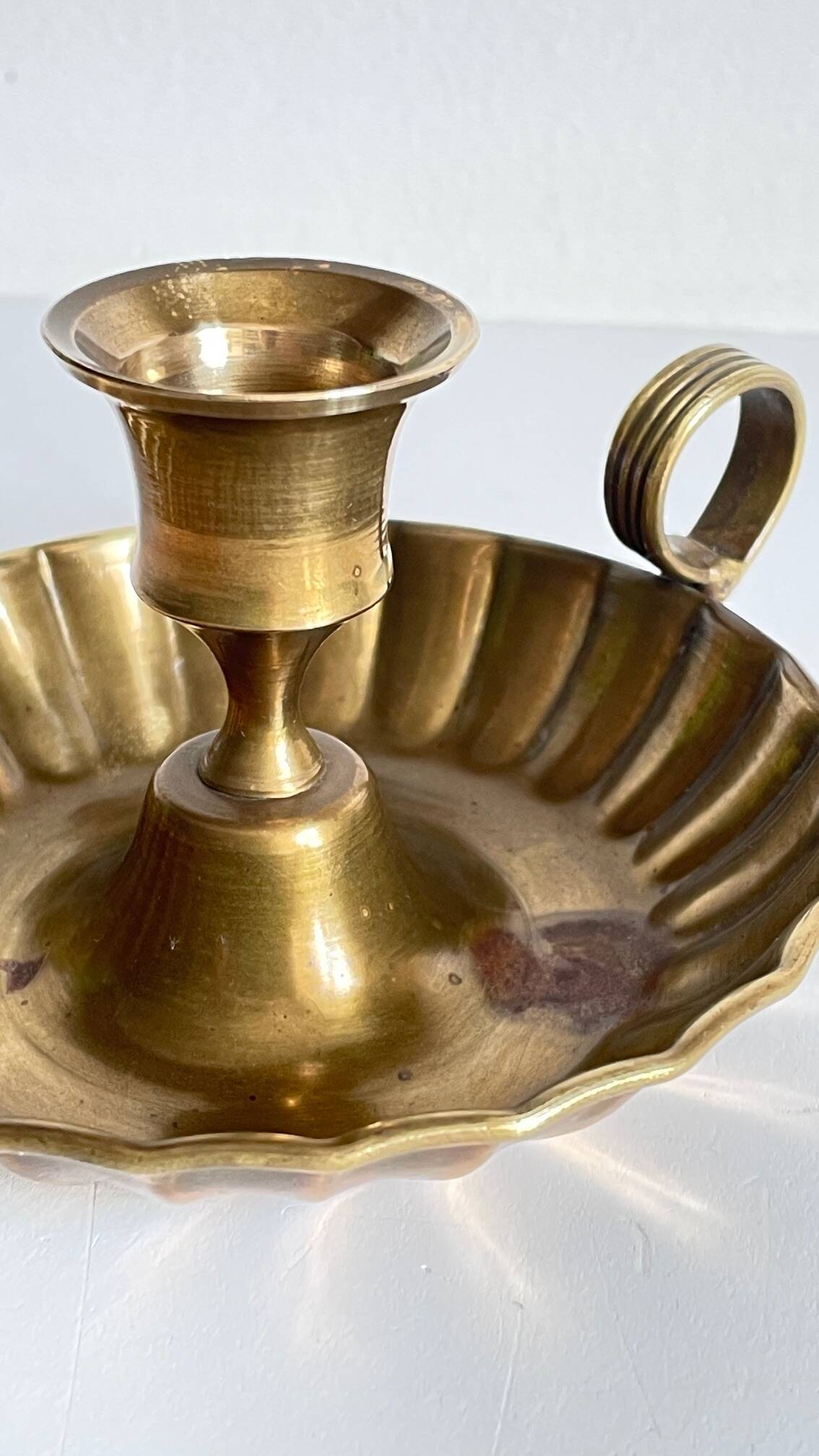 Vintage solid brass hand candle holder