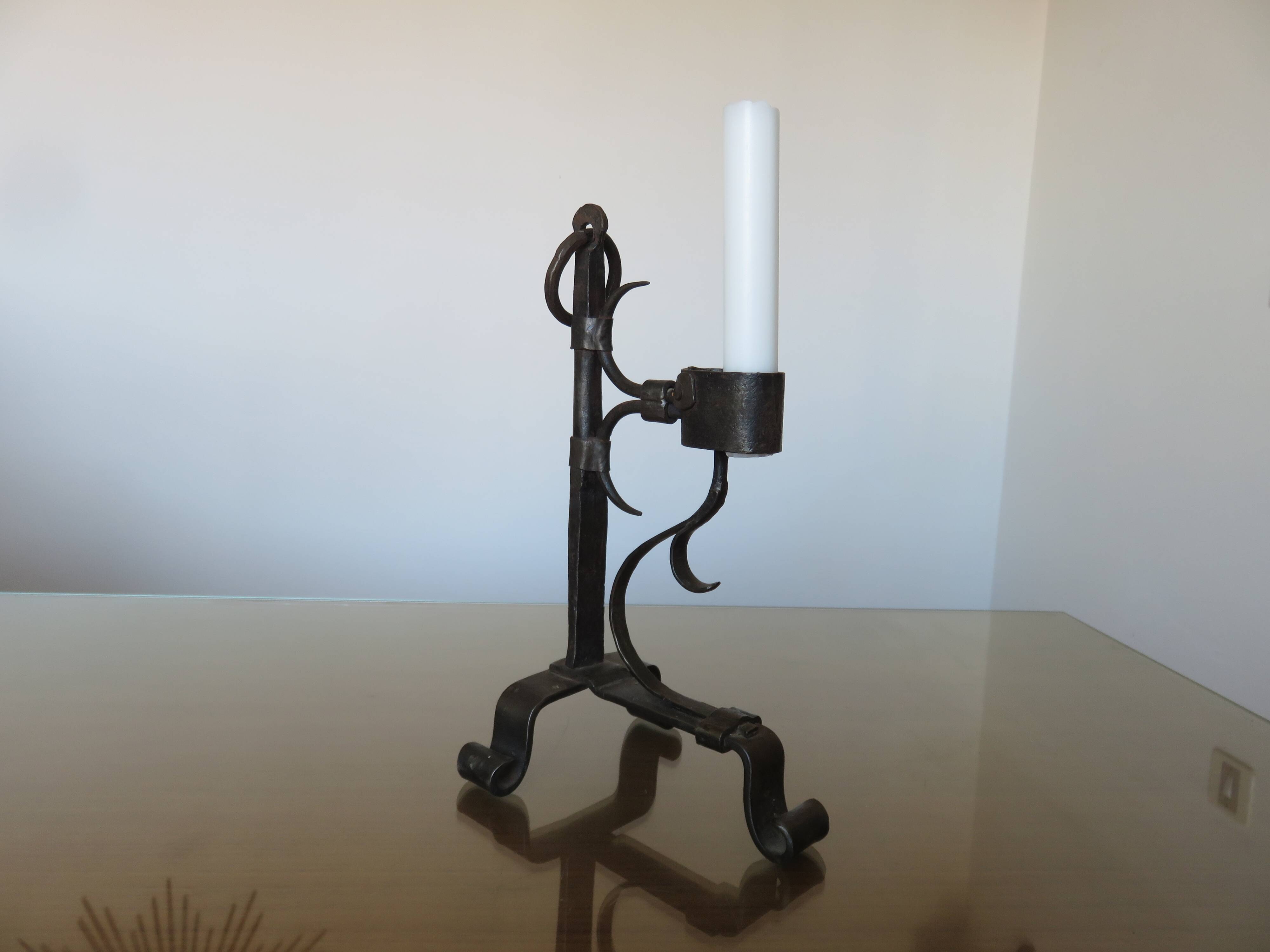 Brutalist candlestick in blackened wrought iron from the 1940s-50s.