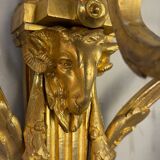 Pair of Louis XVI style wall sconces in gilded bronze, circa 1880.