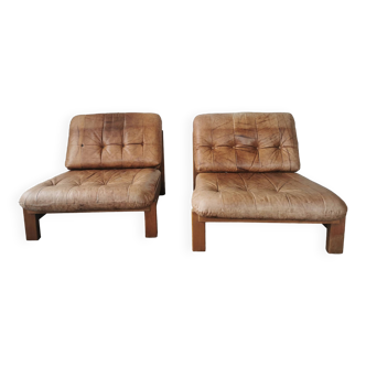 Pair of leather and oak low chairs, 1970 design