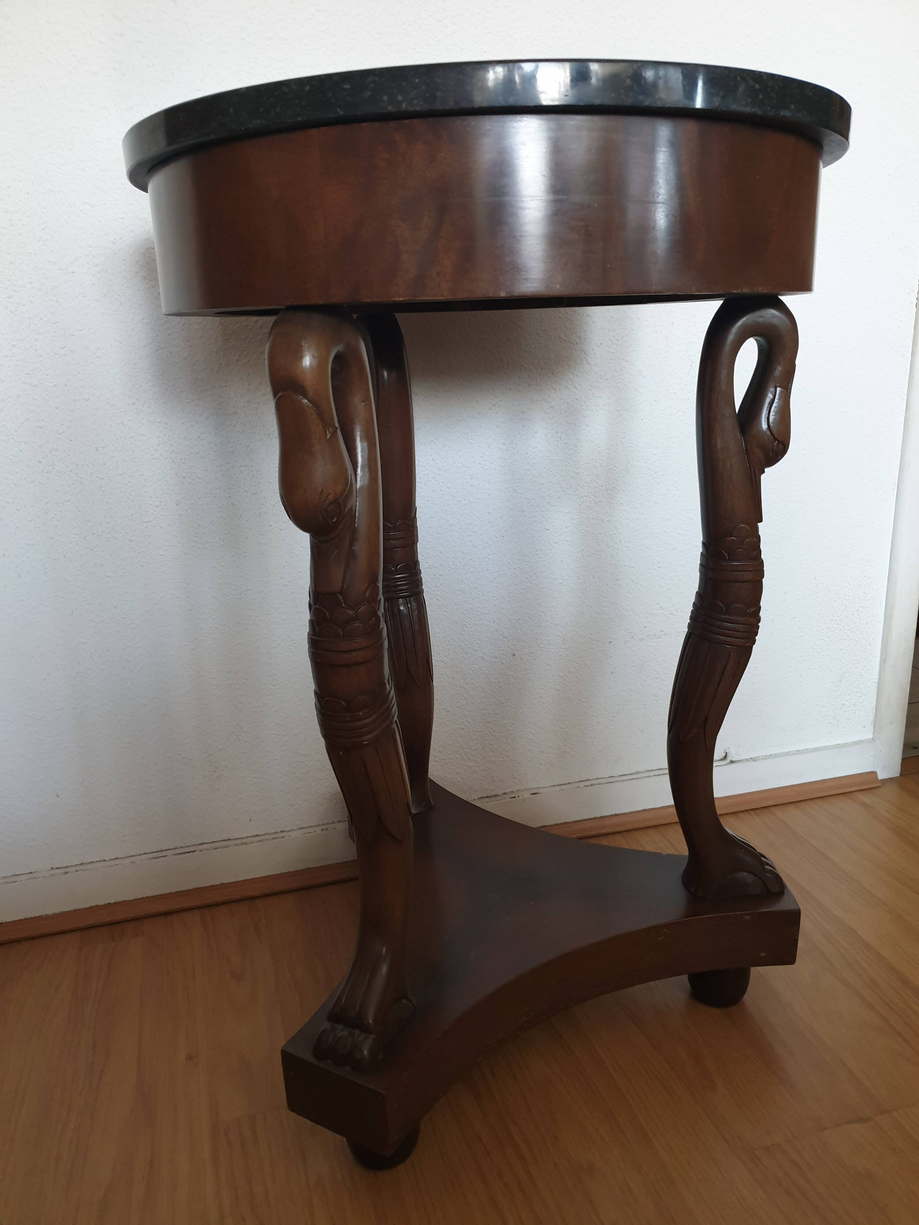 Empire style ceremonial table with mahogany swans