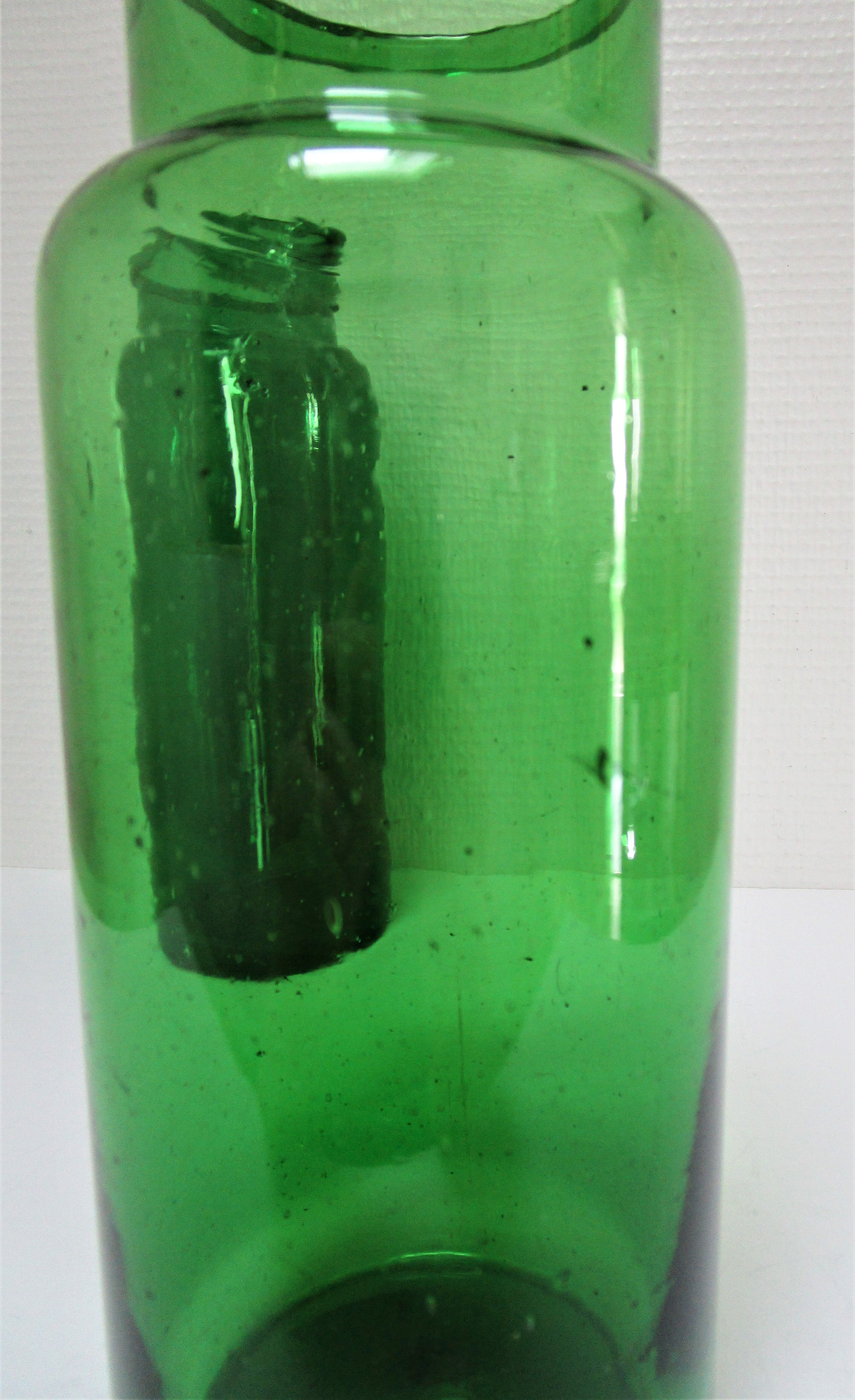 Two old green blown glass jars early 20th century