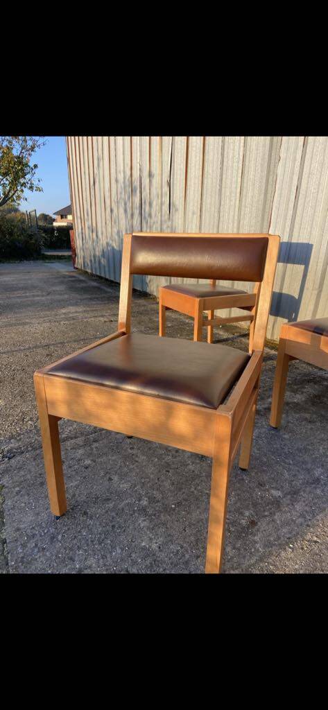 6 wooden chairs and faux leather