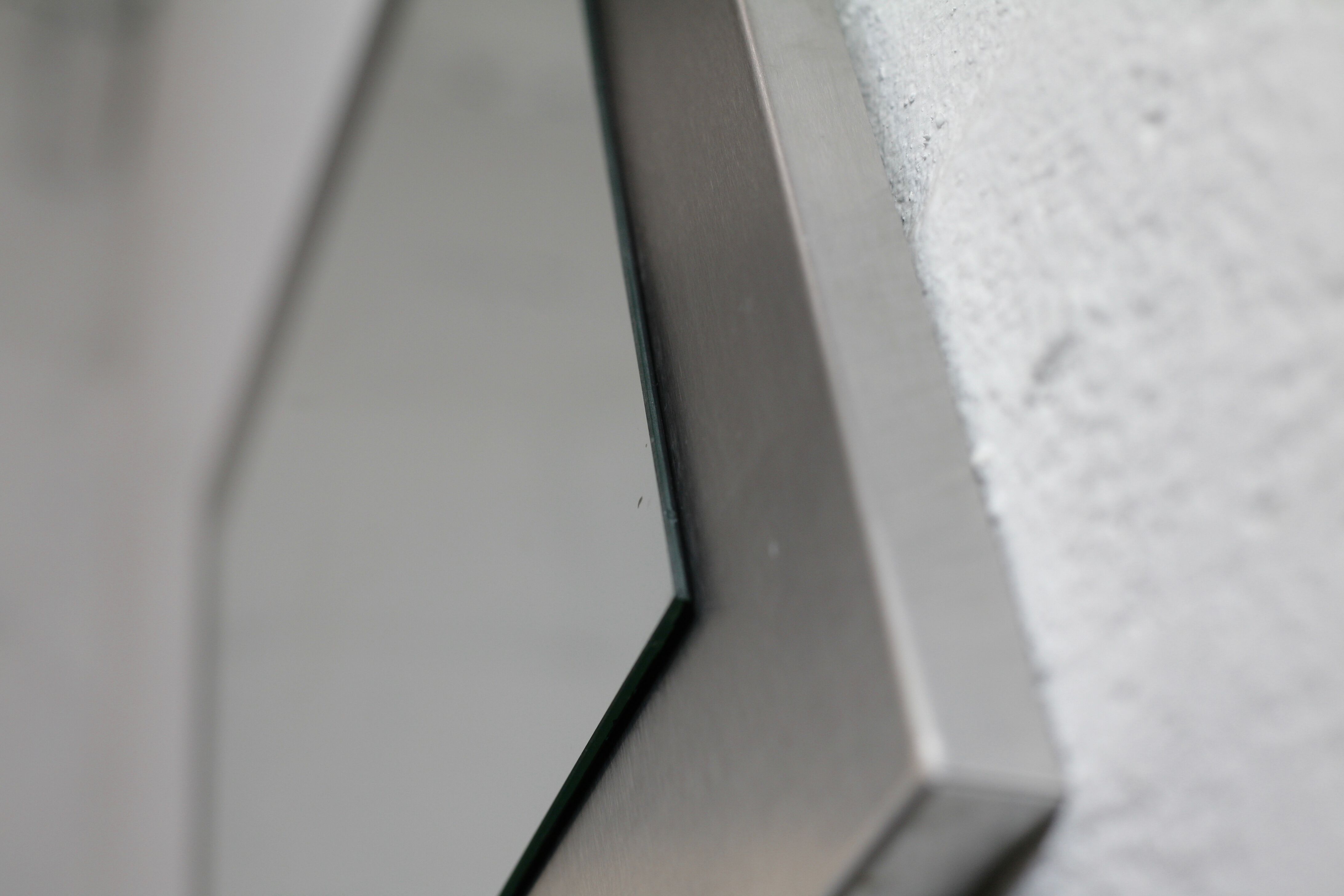 Mirror "space age". Stainless steel. France, circa 1970