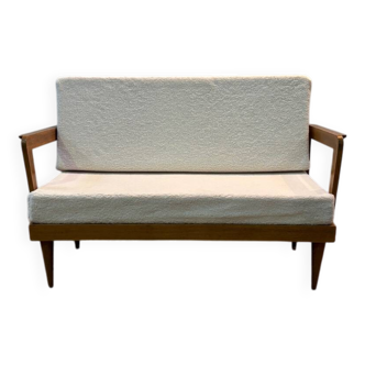 Banquette 1950 en chêne restaurée pieds asymétriques