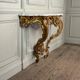 Louis XV style console in carved and gilded wood, circa 1880.